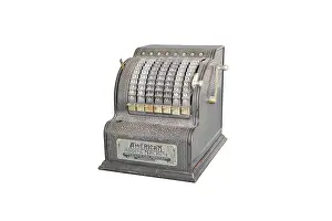 Calculating: Large counter adding machine by American Can Company