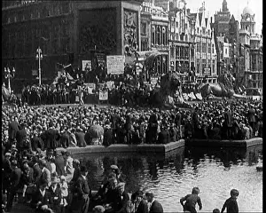 A Large Crowd Gathering In Trafalgar Square