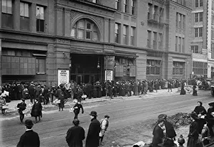 Recession: A large crowd of men and women wait outside ?