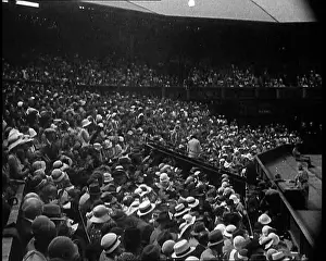 Large Crowd Watching a Tournament in Wimbledon Stadium