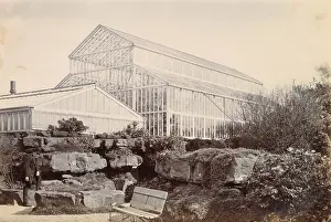 Rockery: Large glass conservatory in a garden, Cheshire