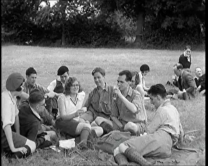 Hikers: A Large Group of Hikers Having Drinks in a Field