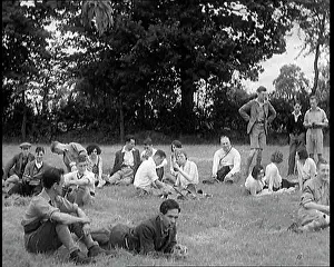 Hikers: A Large Group of Hikers Having Drinks in a Field