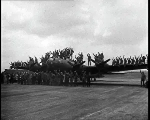 Unison: A Large Group of Male Pilots Standing Around