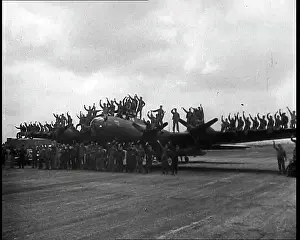Unison: A Large Group of Male Pilots Standing Around
