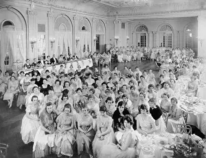 Drape: Large group of people gathered in hall