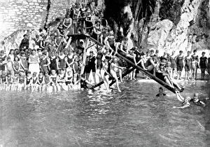 Swimmers: Large group of swimmers with water chute