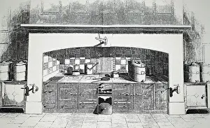 Flanked: Large kitchen range flanked by hot cupboards
