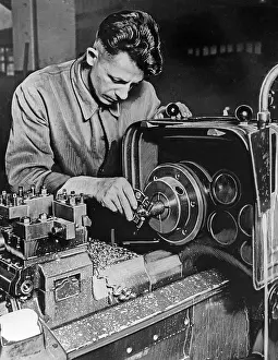 Cutter: Lathe operator at a lathe, 1930s