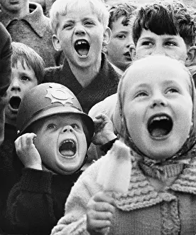 Noise: Laughing children at Punch & Judy Show