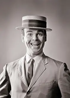 Gleeful: Laughing Man in Straw Boater Hat and Summer Suit