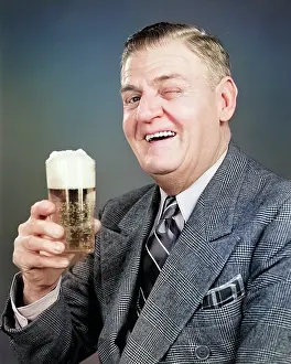Oldsters: Laughing Older Man in Suit and Tie Looking at