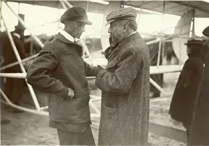 Mans: Lazare Weiller (in the checked cap) and Wilbur Wright