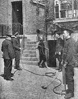 LCC-MFB firemen at drill, Southwark HQ