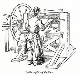 Splitting: Leather splitting machine at a leather factory, south London