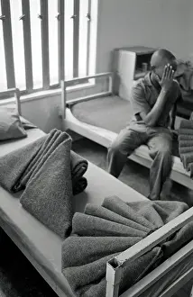 Incarcerated: A Leeuwkop prisoner hides his face inside a cell