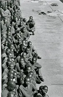 Incarcerated: Leeuwkop prisoners sitting in lines outside in