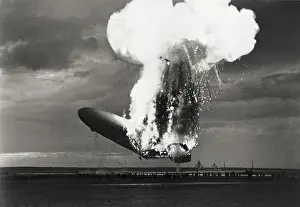 Lighter Than Air: Left side view of German airship Hindenburg burning