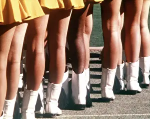 Majorettes: Legs and Boots of High School Majorettes Waiting
