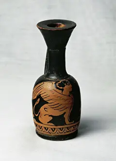 Olive: Lekythos. 4th century BC. Red- figure pottery