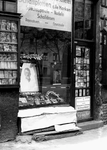 Bookshop: Lending library with portraits of Adolf Hitler in the wi