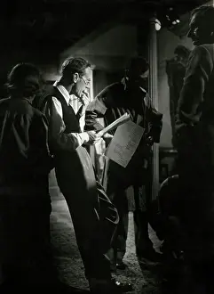 Denham: Leslie Howard concentrating on his lines