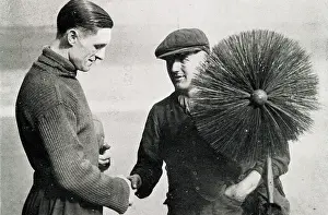 Handshake: Leslie Howe of Tottenham Hotspur with chimney sweep
