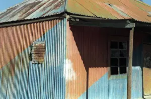 Veld: Lesotho, 2004: A painted tin shack. housing Graeme