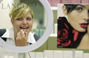 Saleswoman: L'Etoile specialised cosmetics and perfume chain