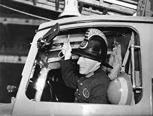 LFB firefighter in enclosed pump vehicle