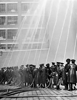 Waterproofs: LFB firefighters in multi-hose display