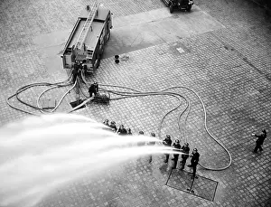 Waterproofs: LFB firefighters in multi-hose display