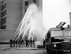 Waterproofs: LFB firefighters in multi-hose display
