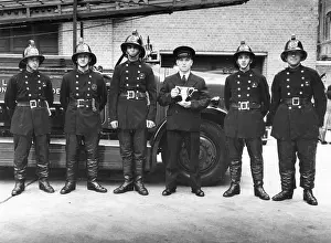 Waterproofs: LFB firefighting crew with open pump vehicle