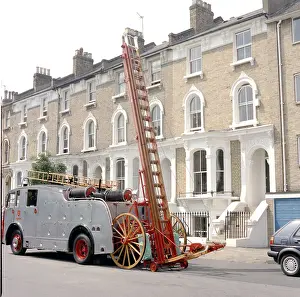 Lfdca: LFDCA-LFB Vintage fire engine in a Clapham street