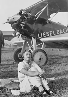 Bach: Liesel Bach in front of her airplane, 1936