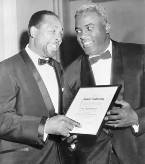 Heavyweights: Light heavyweight champion Archie Moore talks with