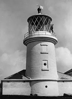 Caldey: Lighthouse being cleaned