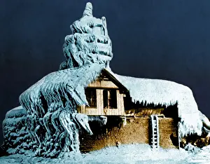 Intense: Lighthouse Covered with Ice