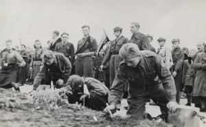 Deaths: Lighting candles for Boy Scouts killed by the Germans