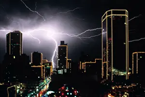 Ble001: Lightning Bolt Discharge Over City Buildings at