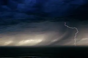 Lightning Strike over Water During Thunder Rain Storm