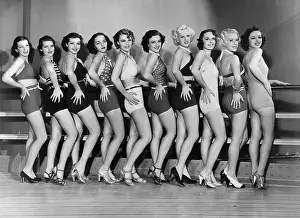 Collaborate: Line of female dancers