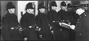 Rollcall: LINE OF POLICEMEN