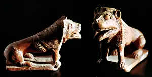 Existed: Two lion figures in fired clay, from the Punic