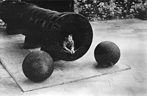1963roger: Little boy inside a cannon at the Tower of London