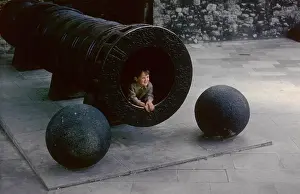1963roger: Little boy inside a cannon at the Tower of London