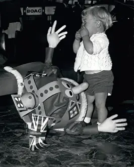 Natty: Little boy meets Ethelbert, puppet king, at Heathrow Airport