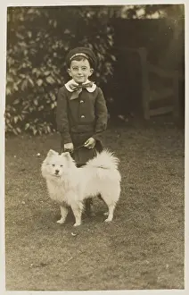 Bespectacled: Little Boy and Pet Dog