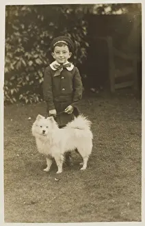 Bespectacled: Little Boy and Pet Dog